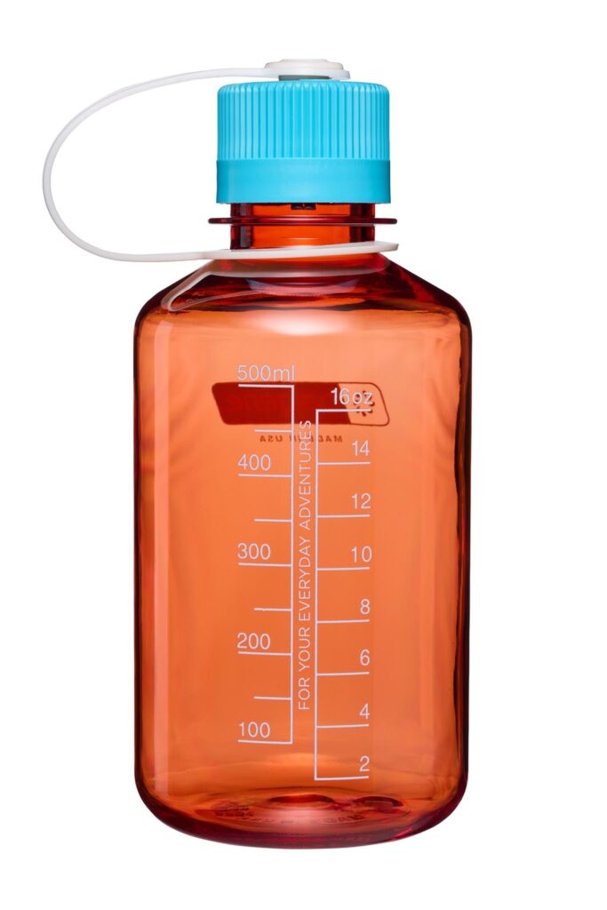 The 16oz NM Thrill & Motion is a translucent orange water bottle with a blue cap, featuring markings up to 500ml and 16oz.