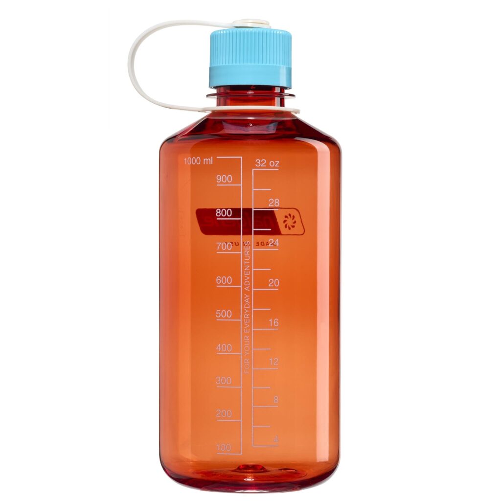 The 32oz NM Thrill in Motion is a transparent red water bottle with a blue cap and white volume markings up to 1000 ml (32 oz).
