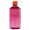 A pink Nalgene water bottle with measurement markings and an orange screw-top lid.
