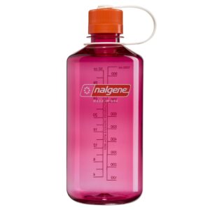 A pink Nalgene water bottle with measurement markings and an orange screw-top lid.