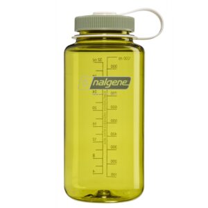 A yellow Nalgene water bottle with a green lid and measurement markings on the side.
