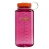 A pink Nalgene water bottle with an orange lid and white measurement markings.